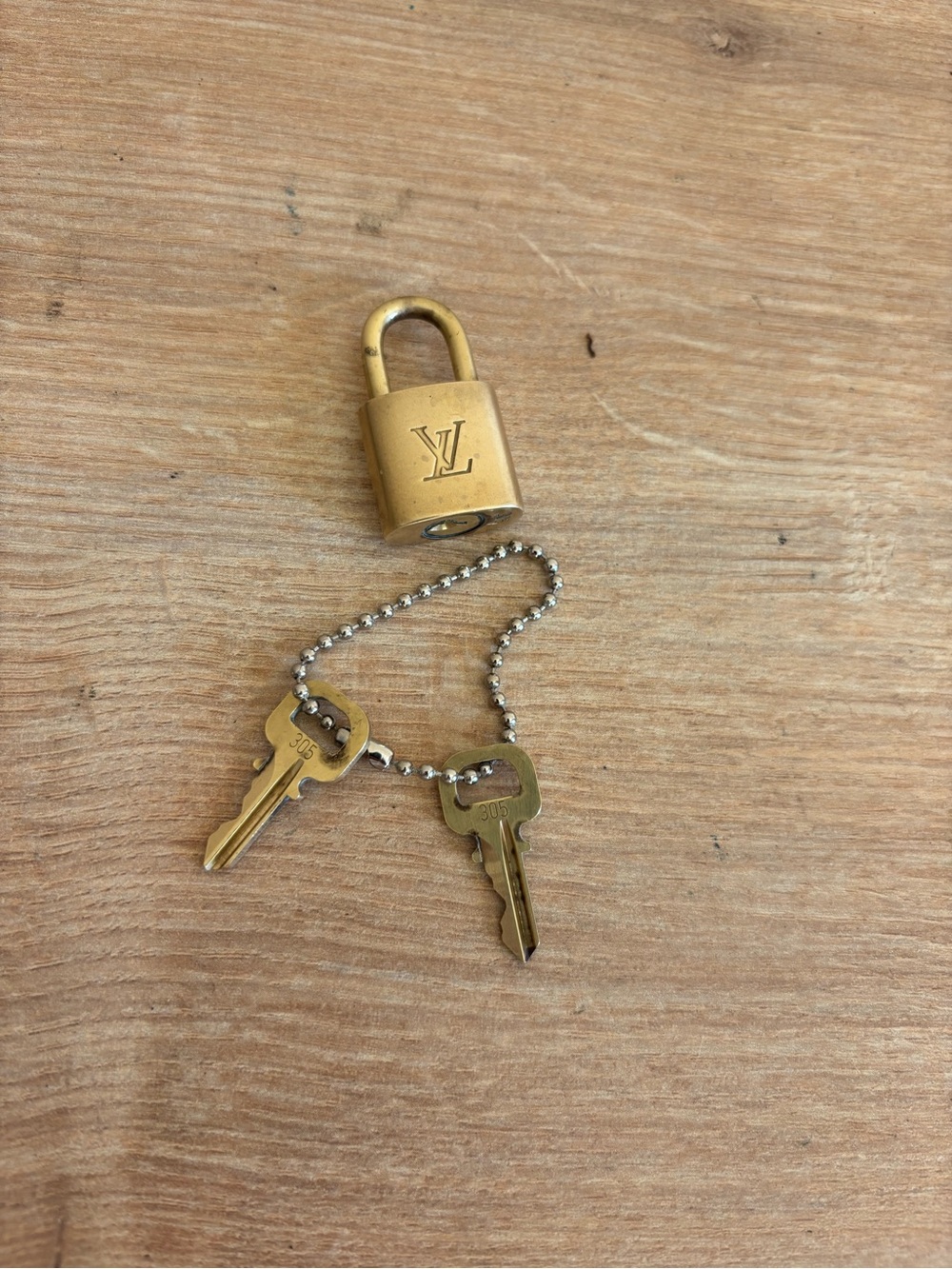 Authentic Louis Vuitton lock and keys set
